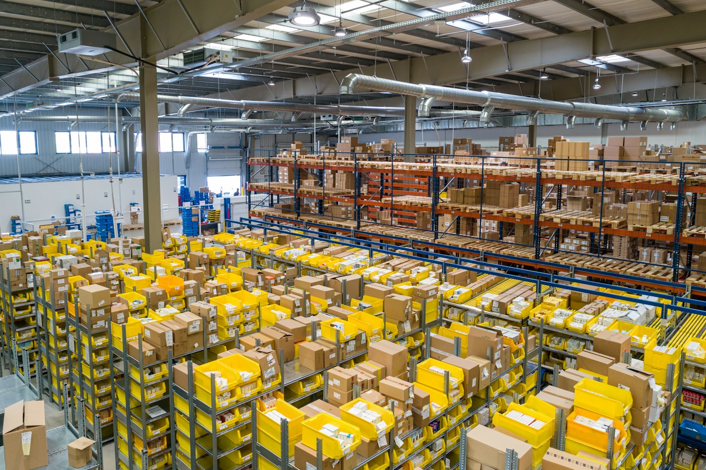 Bins and shelves of stock waiting to be counted.